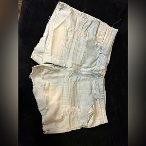 Light wash distressed jean shorts